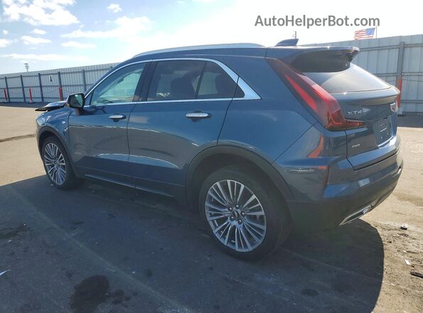1GYFZDR40RF159716 2024 CADILLAC XT4 Синий Задняя левая четверть