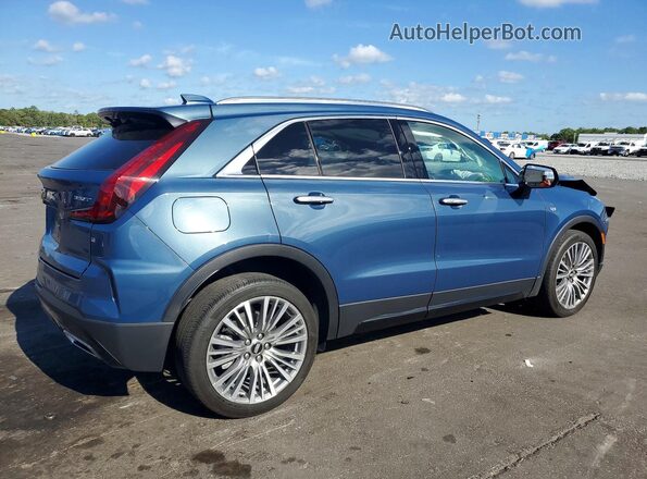 1GYFZDR40RF159716 2024 CADILLAC XT4 Синий Задняя правая четверть