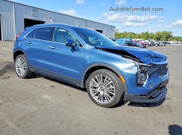 1GYFZDR40RF159716 2024 CADILLAC XT4 Синий Передняя правая четверть