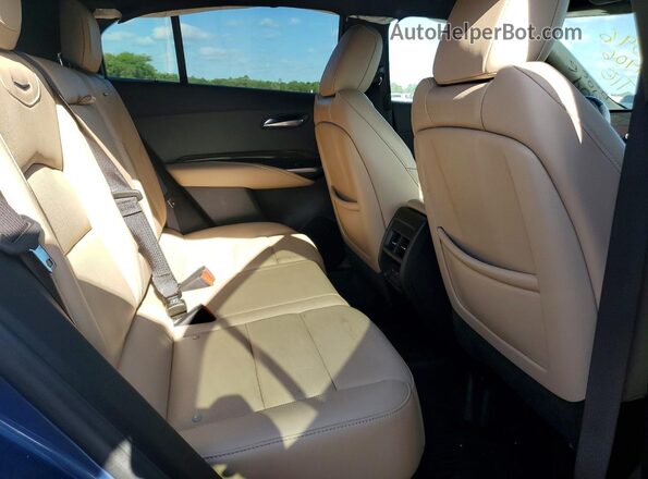 1GYFZDR40RF159716 2024 CADILLAC XT4 Синий Вид задней части салона