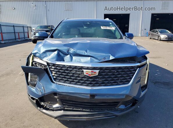 1GYFZDR40RF159716 2024 CADILLAC XT4 Синий Вид спереди