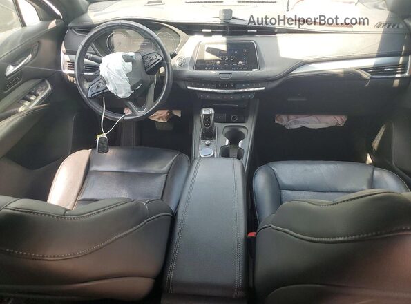 1GYFZDR43KF101072 2019 CADILLAC XT4 Серый Вид панели приборов