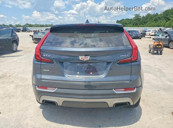 1GYFZDR43KF101072 2019 CADILLAC XT4 Серый Вид сзади