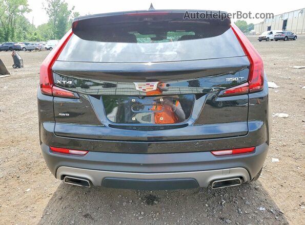 1GYFZDR43MF070456 2021 CADILLAC XT4 Black Հետևի տեսք