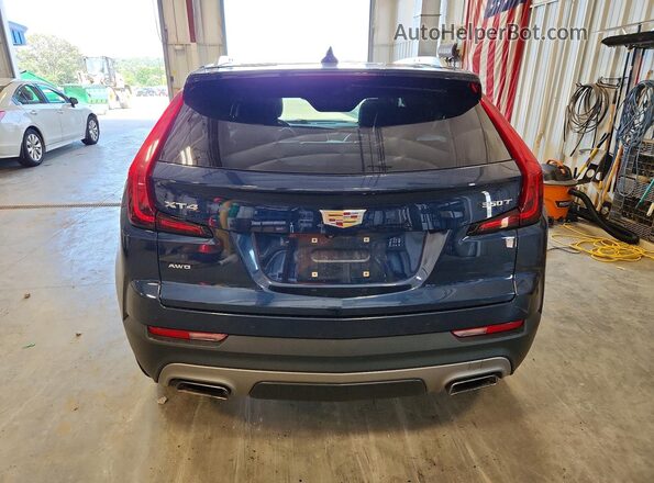1GYFZDR44LF048187 2020 CADILLAC XT4 Blue უკანა ხედი