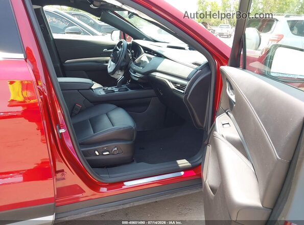 1GYFZDR44MF074452 2021 CADILLAC XT4 Red Вид салону спереду