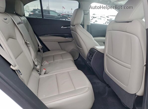 1GYFZDR45KF144800 2019 CADILLAC XT4 White Vista interior trasera