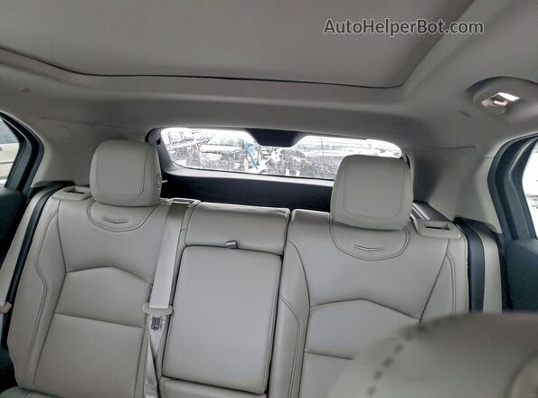 1GYFZDR45KF144800 2019 CADILLAC XT4 White Vista de los asientos traseros
