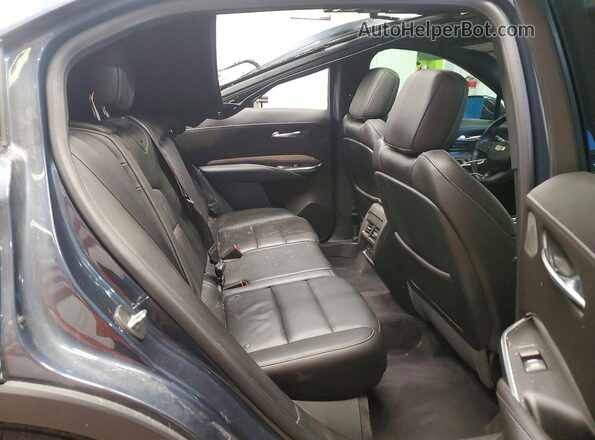 1GYFZDR46KF109439 2019 CADILLAC XT4 Blue Widok wnętrza z tyłu