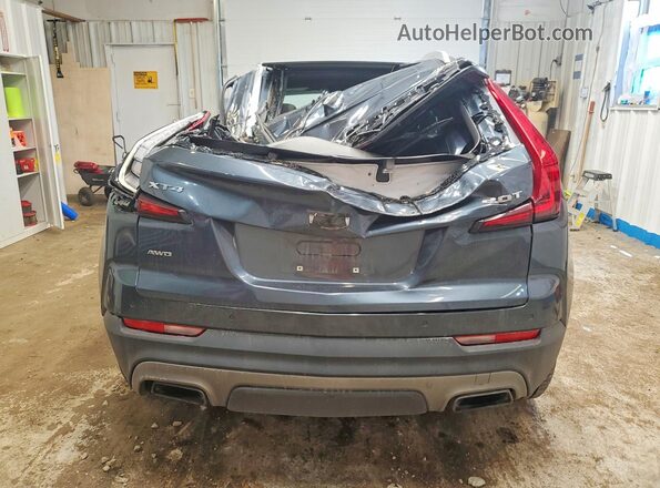 1GYFZDR46KF109439 2019 CADILLAC XT4 Blue Widok z tyłu