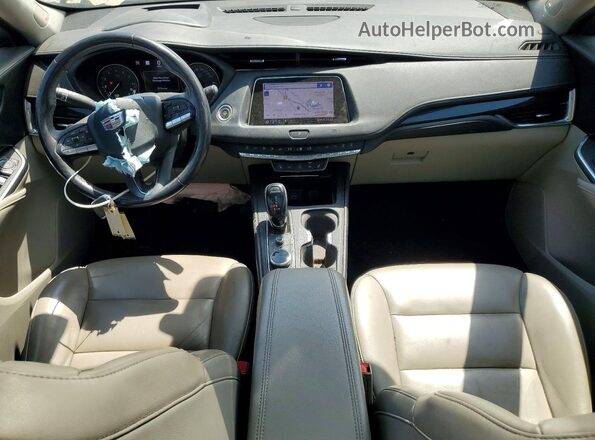 1GYFZDR46LF049812 2020 CADILLAC XT4 Purple Առջևի վահանակի տեսք