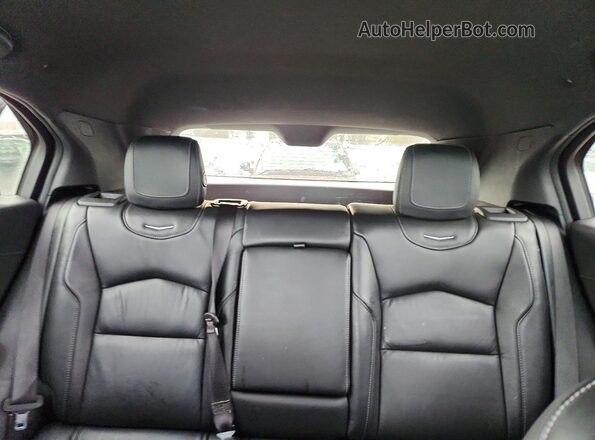 1GYFZDR47LF097822 2020 CADILLAC XT4 Silver Vista de los asientos traseros