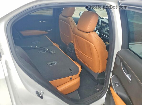 1GYFZDR47PF185386 2023 CADILLAC XT4 White Вид задньої частини салону