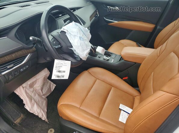 1GYFZDR47PF185386 2023 CADILLAC XT4 White Вид салону спереду