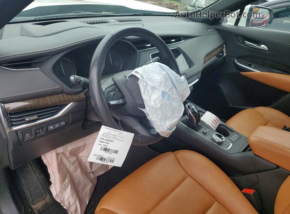 1GYFZDR47PF185386 2023 CADILLAC XT4 White Вид панелі приладів