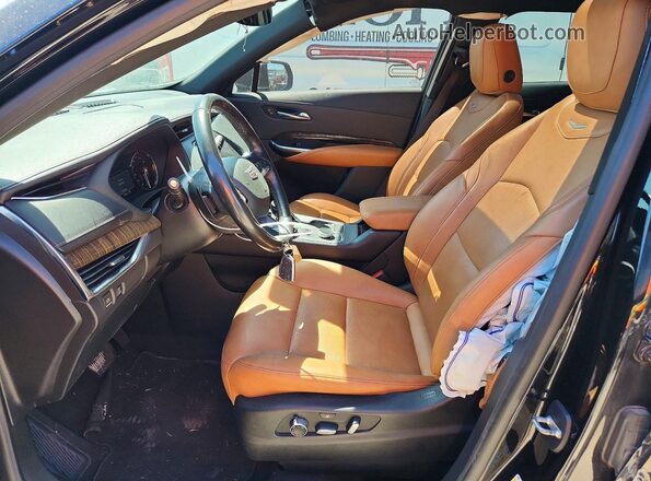 1GYFZDR49MF020175 2021 CADILLAC XT4 Black წინა სალონის ხედი