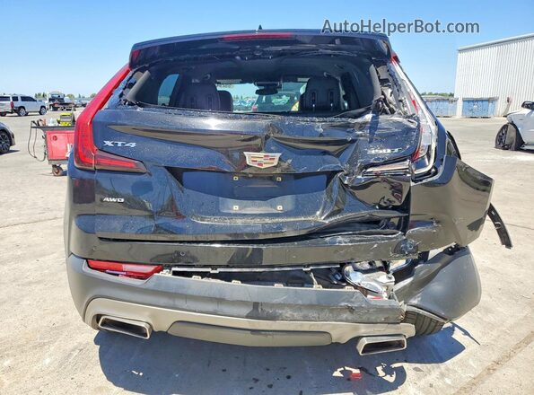 1GYFZDR49NF100125 2022 CADILLAC XT4 Black უკანა ხედი