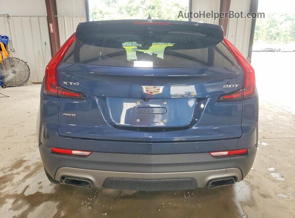 1GYFZDR4XKF218681 2019 CADILLAC XT4 Blue Rear view