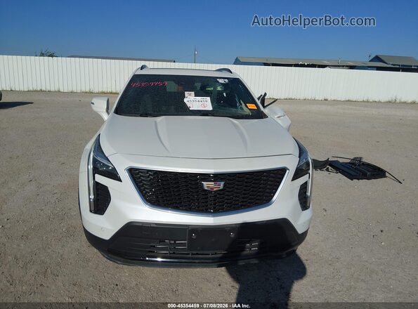 1GYFZER41NF105602 2022 CADILLAC XT4 White ხელსაწყოთა პანელის ხედი