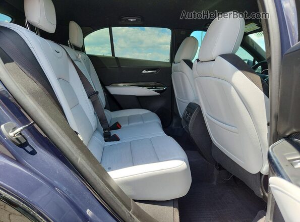 1GYFZER41RF124866 2024 CADILLAC XT4 Синий Вид задней части салона