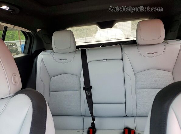 1GYFZER41SF111668 2025 CADILLAC XT4 Burgundy Rear seats view