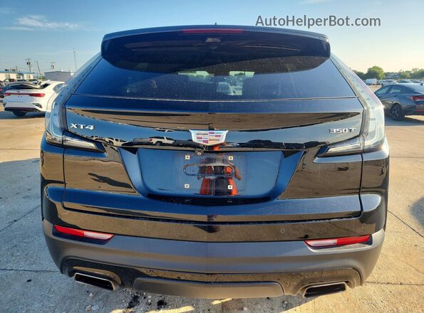 1GYFZER44NF159119 2022 CADILLAC XT4 Black Вид ззаду