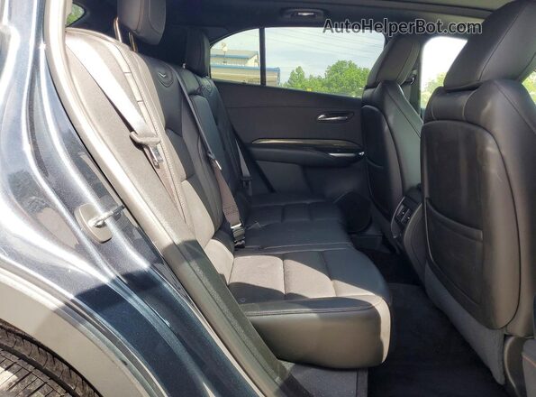 1GYFZER47KF101372 2019 CADILLAC XT4 Синий Вид задней части салона