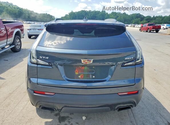 1GYFZER47KF174046 2019 CADILLAC XT4 Серый Вид сзади