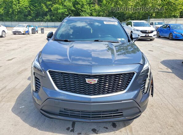 1GYFZER47KF174046 2019 CADILLAC XT4 Серый Вид спереди
