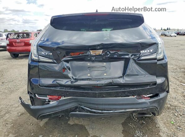 1GYFZER49KF137466 2019 CADILLAC XT4 Черный Вид сзади