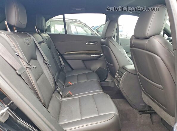 1GYFZER49KF137466 2019 CADILLAC XT4 Черный Вид задней части салона
