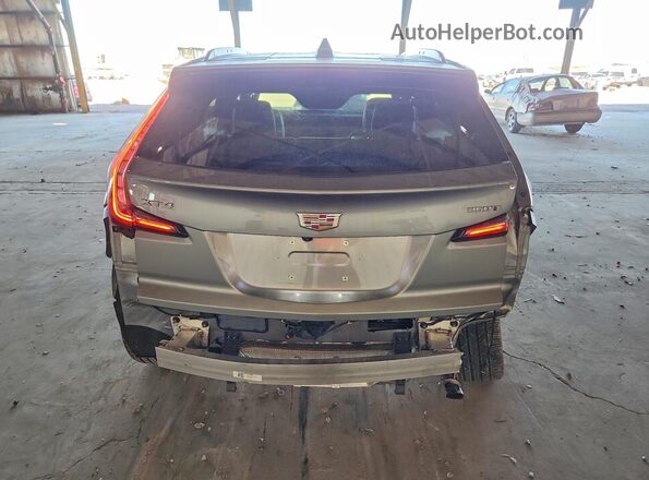 1GYFZER4XRF215652 2024 CADILLAC XT4 Silver უკანა ხედი