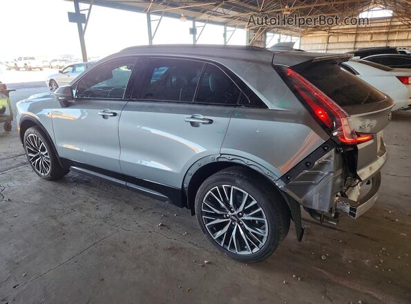 1GYFZER4XRF215652 2024 CADILLAC XT4 Silver უკანა მარცხენა