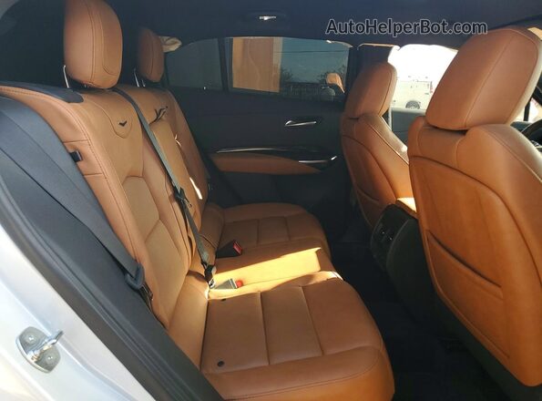 1GYFZFR40RF159100 2024 CADILLAC XT4 White Vista interior trasera