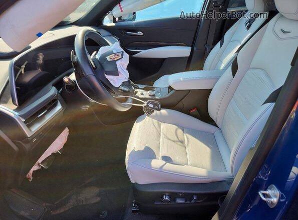 1GYFZFR41RF199072 2024 CADILLAC XT4 Синий Вид салона спереди