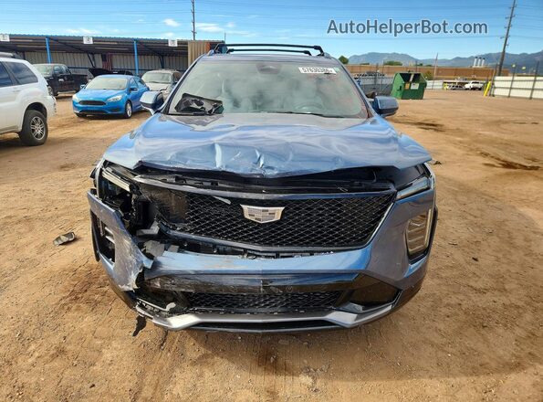 1GYFZFR41RF199072 2024 CADILLAC XT4 Синий Вид спереди