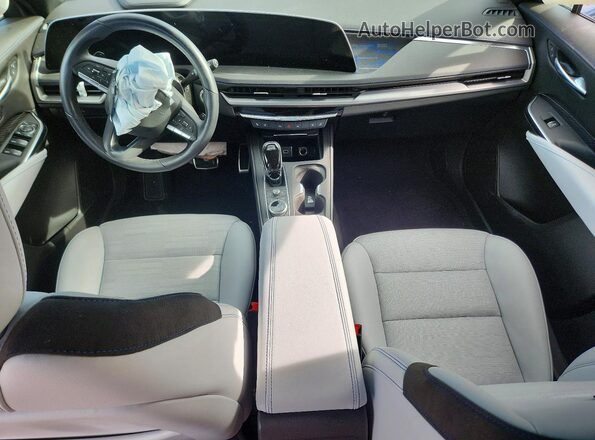 1GYFZFR41RF199072 2024 CADILLAC XT4 Синий Вид панели приборов