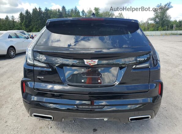 1GYFZFR45RF214625 2024 CADILLAC XT4 Черный Вид сзади