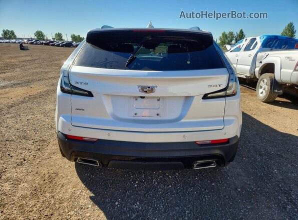 1GYFZFR4XPF106806 2023 CADILLAC XT4 White Rear view