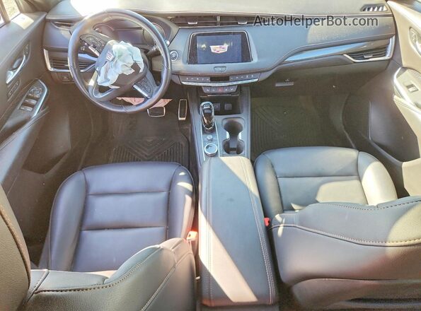 1GYFZFR4XPF106806 2023 CADILLAC XT4 White Dashboard view