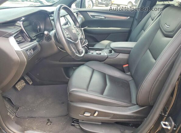 1GYKNAR48PZ148094 2023 CADILLAC XT5 Черный Вид салона спереди