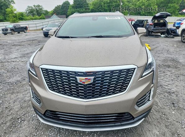 1GYKNCR45PZ140465 2023 CADILLAC XT5 Tan Вид спереду