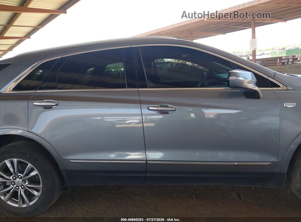 1GYKNCRSXMZ104362 2021 CADILLAC XT5 Gray Vista interior trasera