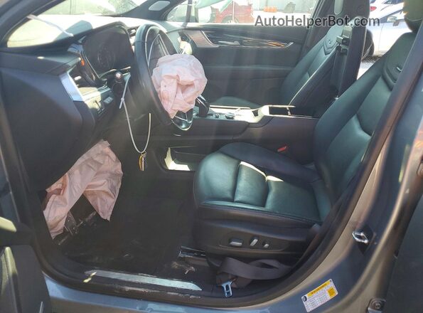 1GYKNDR48PZ224849 2023 CADILLAC XT5 Teal წინა სალონის ხედი