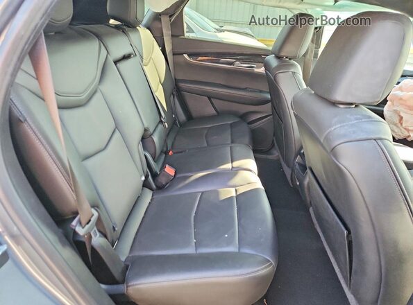 1GYKNDR4XMZ144688 2021 CADILLAC XT5 Silver Rear interior view