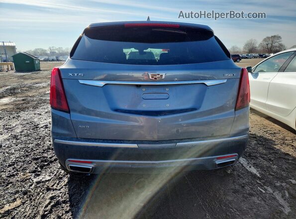 1GYKNDR4XMZ144688 2021 CADILLAC XT5 Silver Rear view