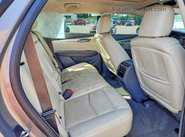 1GYKNERS5KZ165224 2019 CADILLAC XT5 Tan Widok wnętrza z tyłu
