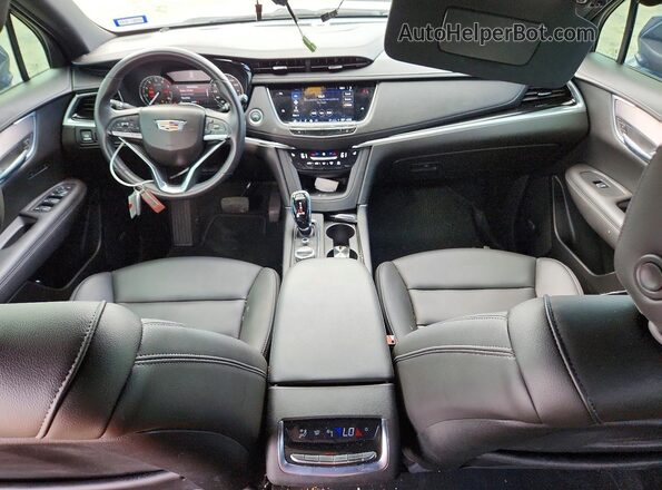 1GYKPAR43RZ709377 2024 CADILLAC XT6 Blue Dashboard view