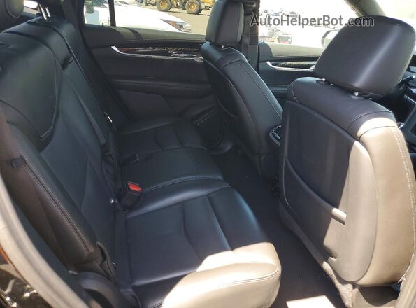 1GYKPCRS4PZ220185 2023 CADILLAC XT6 Black Widok wnętrza z tyłu