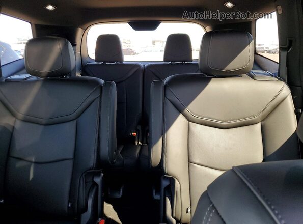 1GYKPCRS4SZ116725 2025 CADILLAC XT6 Black Vista de los asientos traseros